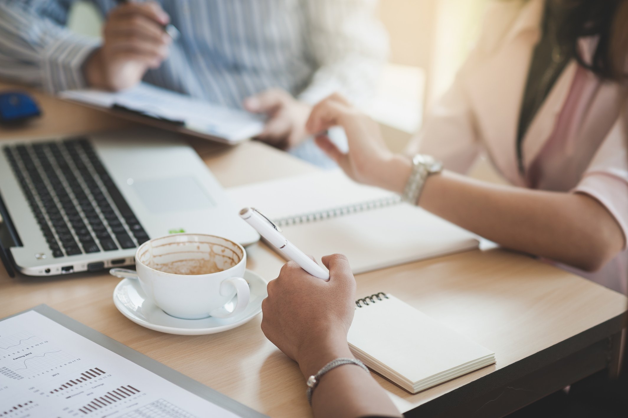 Two women participate business meeting